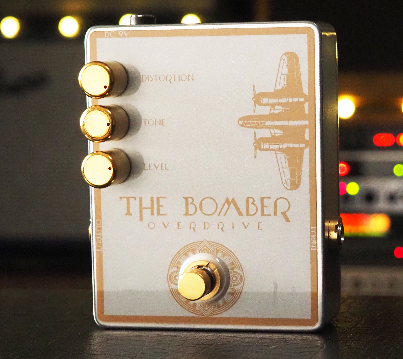The Bomber Overdrive pedal on a wooden table